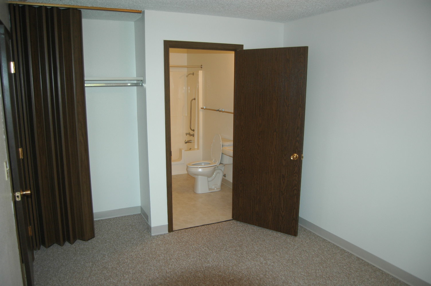 Looking into bathroom from bedroom